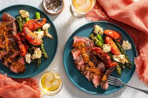 Black Angus steaks with garlic butter, asparagus, and fresh mozzarella