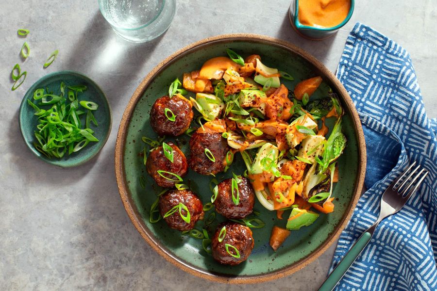 Korean BBQ meatballs with baby bok choy and avocado-orange salad