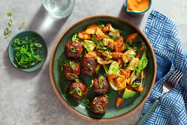 Korean BBQ meatballs with baby bok choy and avocado-orange salad
