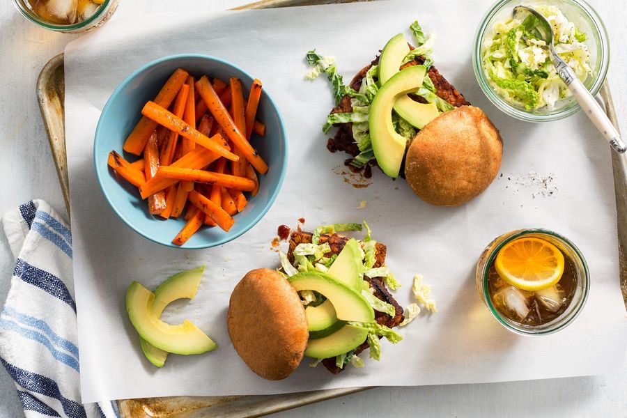 Reuben-style tempeh sandwiches with avocado and carrot fries