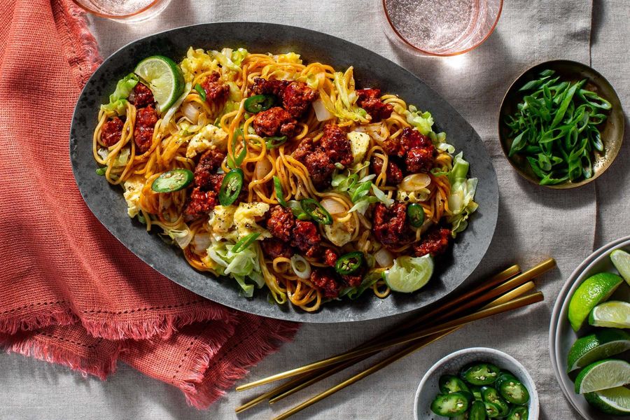 Mee goreng with your choice of protein, fresh ramen, and scrambled eggs