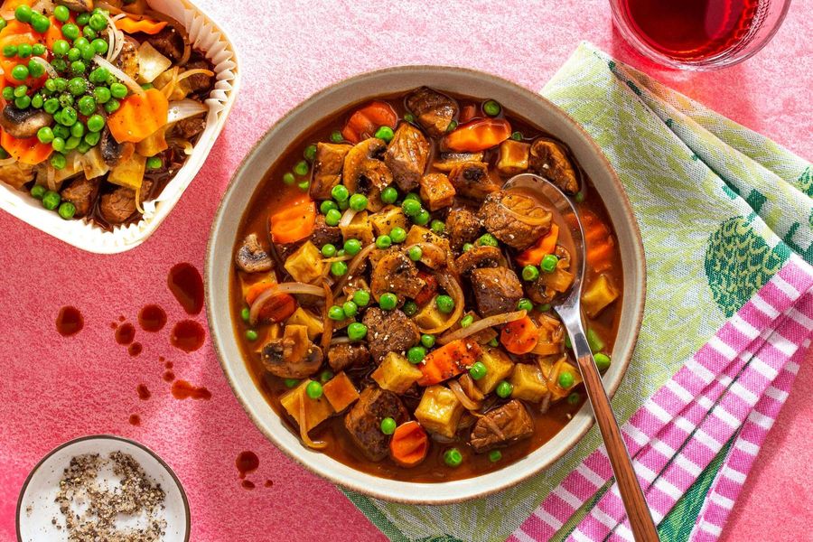 Classic beef stew with potatoes, mushrooms, and peas