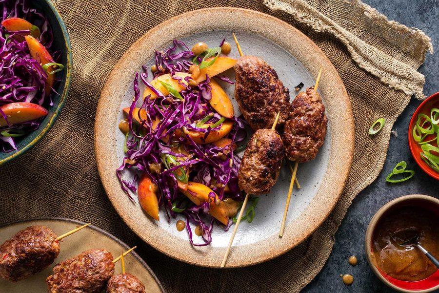 Korean skewers with your choice of protein and sesame-cabbage slaw