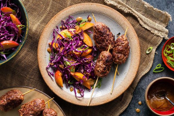 Korean beef skewers with sesame-cabbage slaw