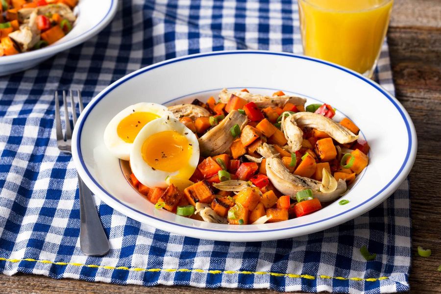 Shredded chicken and sweet potato hash with soft-cooked eggs