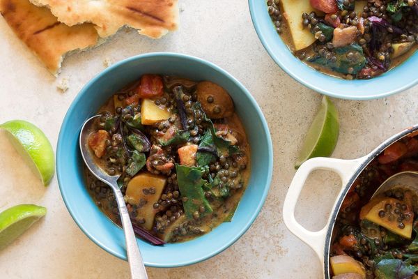 Curried black lentils and potatoes with chard and naan