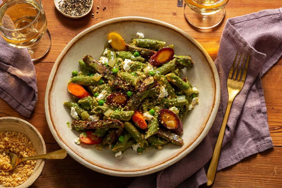 Stovetop penne casserole with carrots, peas, and ricotta
