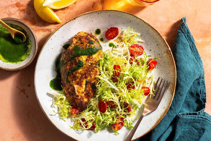 Santa Fe spiced chicken breasts with warm tomato-frisée salad