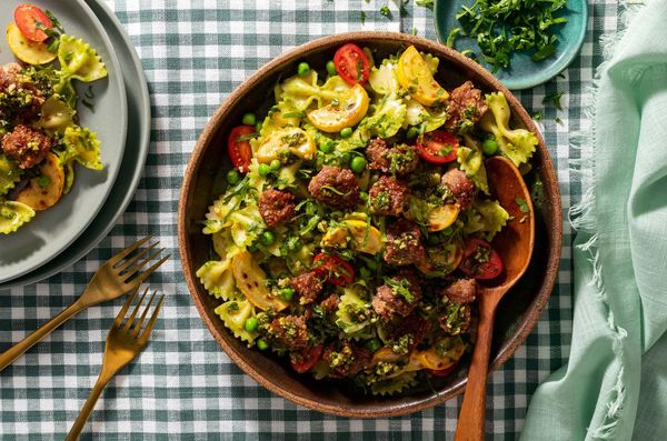 Farfalle with ground beef, yellow squash, and arugula-pistachio pesto