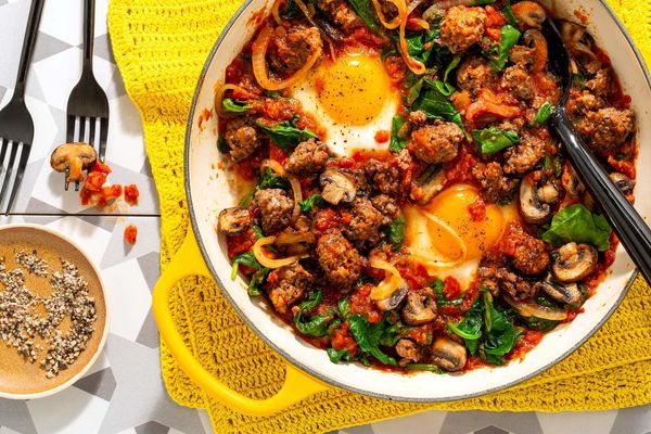 Eggs in purgatory with spicy turkey, mushrooms, and kale
