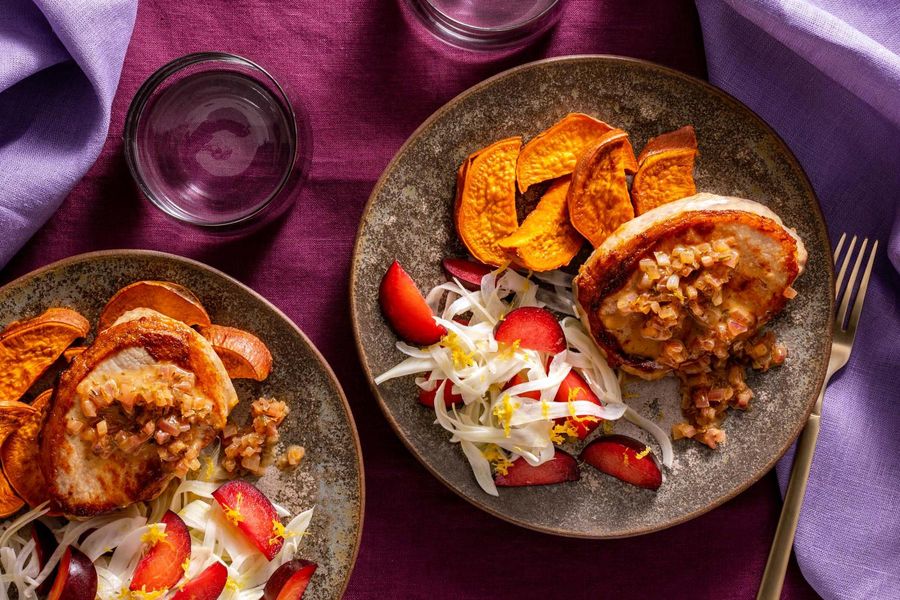 Pork chops with roasted sweet potato and plum-fennel salad