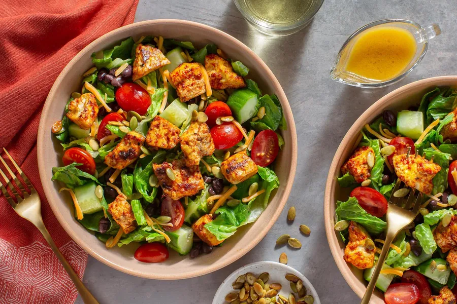 Chipotle BBQ tofu salad with black beans and honey-mustard vinaigrette