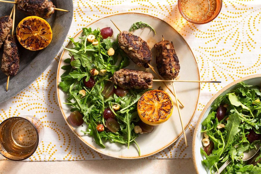 Greek souzoukaklia beef skewers with arugula-grape salad