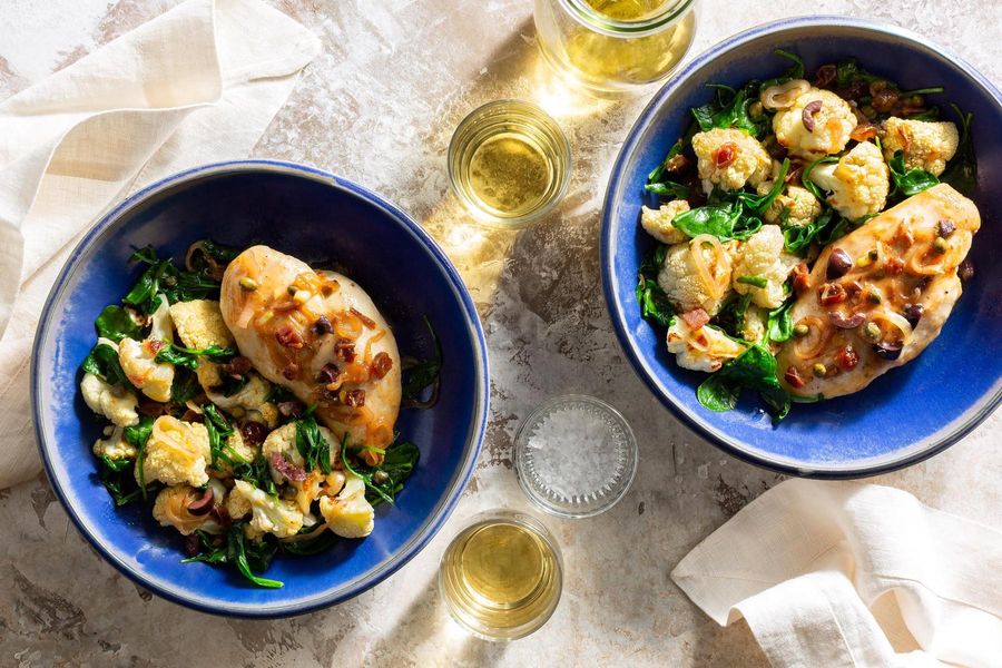 Chicken Marbella with pan-roasted olives, dates, and cauliflower