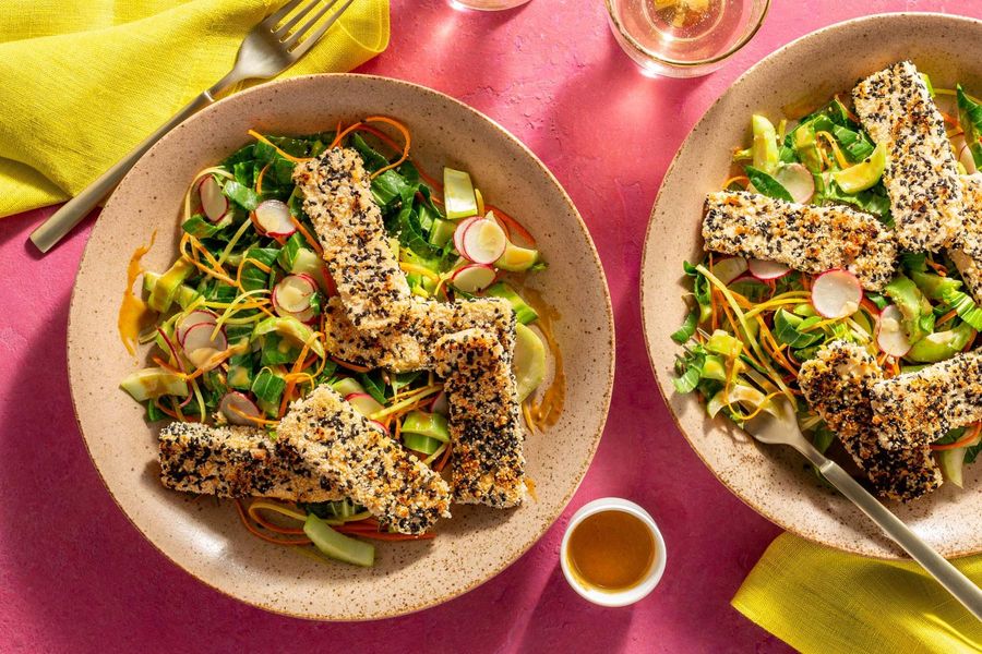 Crispy sesame-miso tofu over bok choy salad with cashew-lime dressing