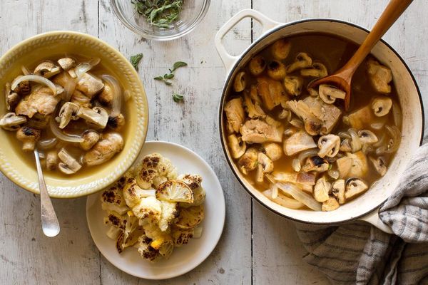 Braised chicken and mushrooms with roasted cauliflower and lemon