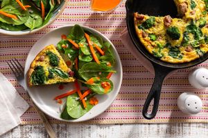 Sausage-broccoli frittata with spinach salad and red pepper vinaigrette