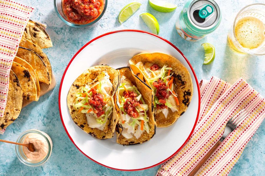 Tacos with cabbage slaw, salsa roja, and chipotle yogurt