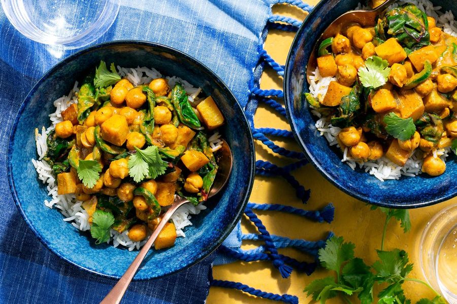 Curried chickpeas and sweet potato with chard over basmati rice
