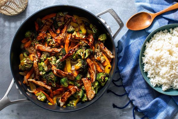 Hot and sour chicken stir-fry with vegetables and long-grain rice