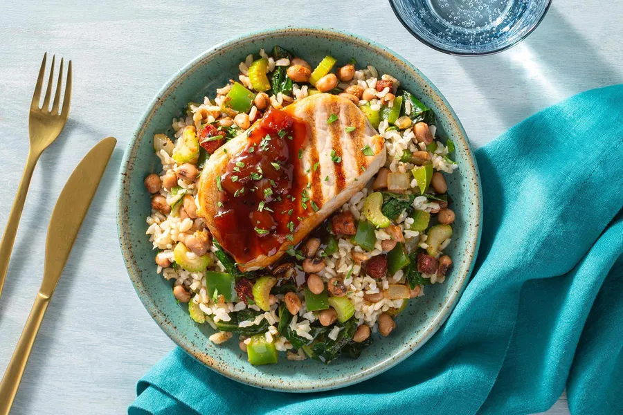 Maple glazed pork chop over Hoppin' John with collards and pancetta