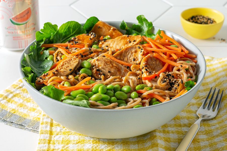 Grilled chicken soba bowl with mixed greens and sesame dressing