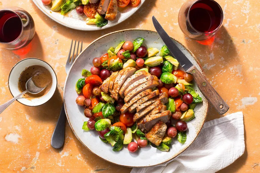 Mediterranean pork chops with Brussels sprouts and lemon vinaigrette