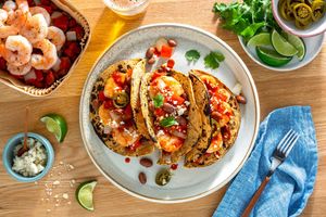 Shrimp diablo tacos with roasted peppers and queso fresco