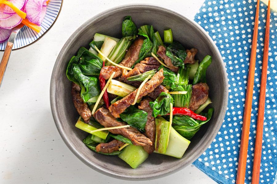 Ginger and bok choy stir-fry with pickled daikon salad