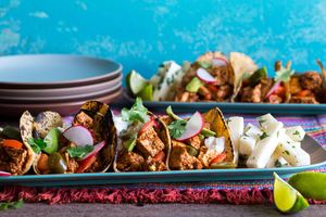 Tofu mole tacos with avocado and jicama sticks