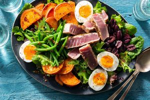 Seared albacore tuna steaks with green beans and soft-cooked eggs