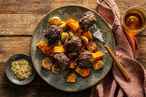 Turkey-cranberry meatballs with roasted Brussels sprouts and sweet potato