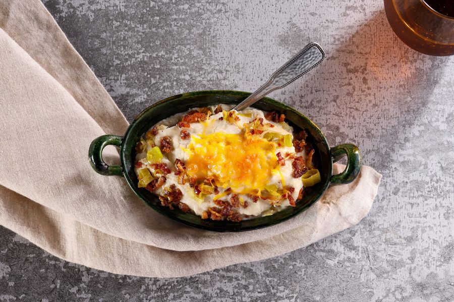 Loaded Mashed Potato Casserole with Bacon, Leeks, and Cheddar