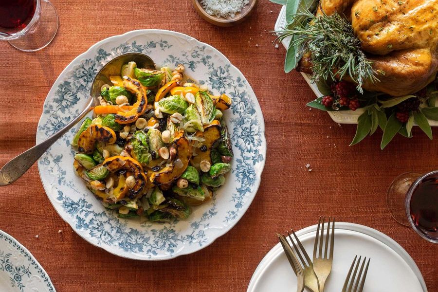 Brussels sprouts with delicata squash, currants, and hazelnuts