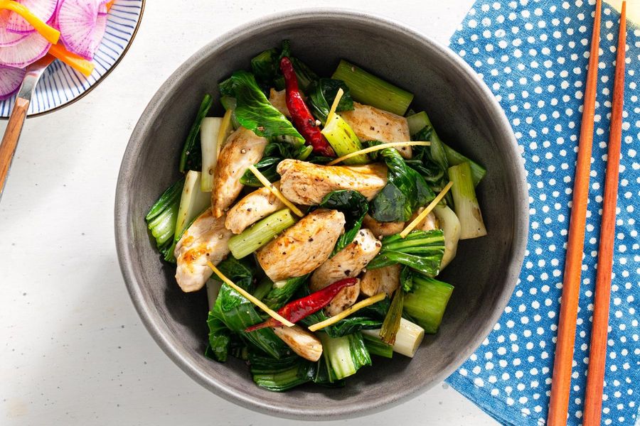 Ginger chicken and bok choy stir-fry with pickled daikon salad