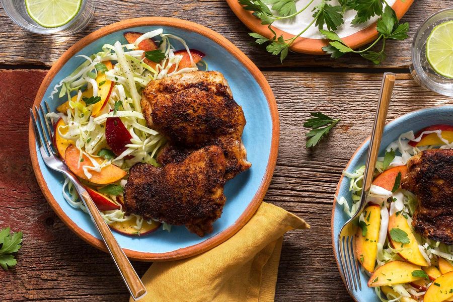 Spicy jerk chicken with gingered peach slaw