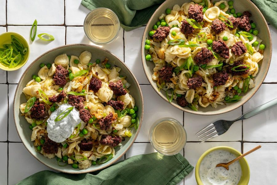 Orecchiette with cabbage, peas, and your choice of protein