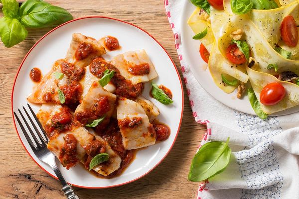 Sole arrabbiata and squash-ribbon salad with tomato and basil