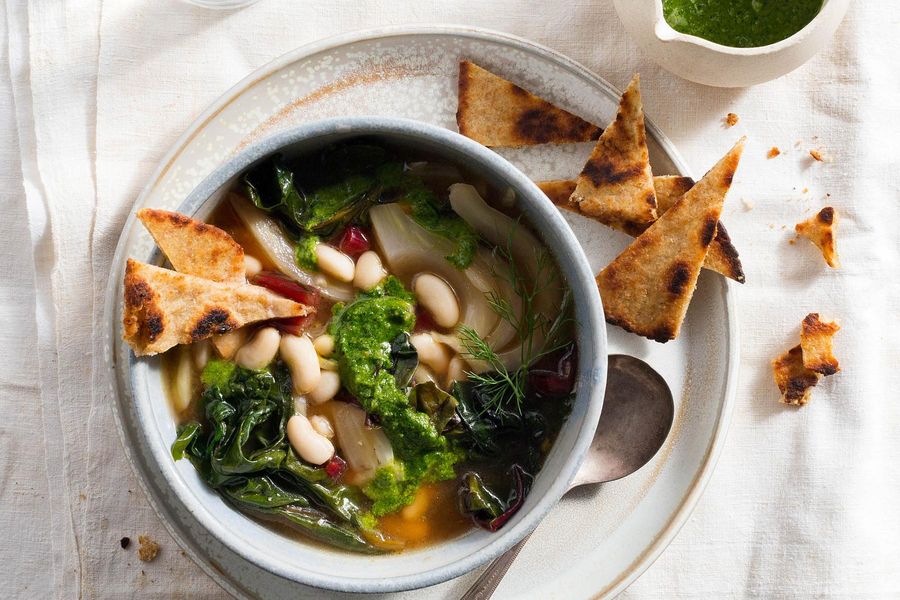 Summer fennel–white bean soup with basil pesto and naan croutons