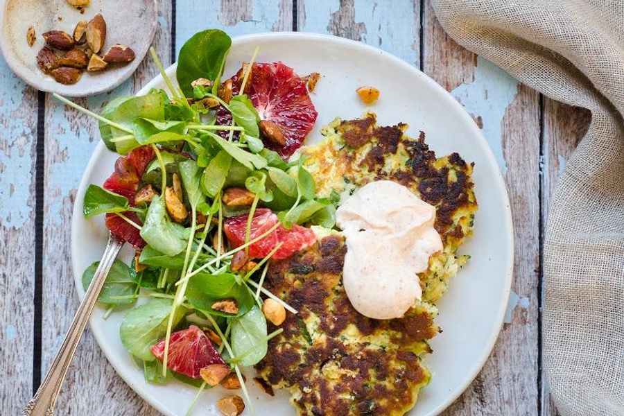 Zucchini fritters with spiced yogurt, watercress and toasted almonds