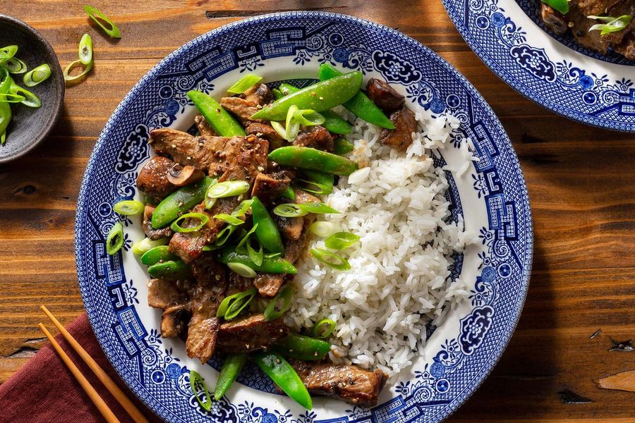 Black peppercorn beef stir-fry over rice