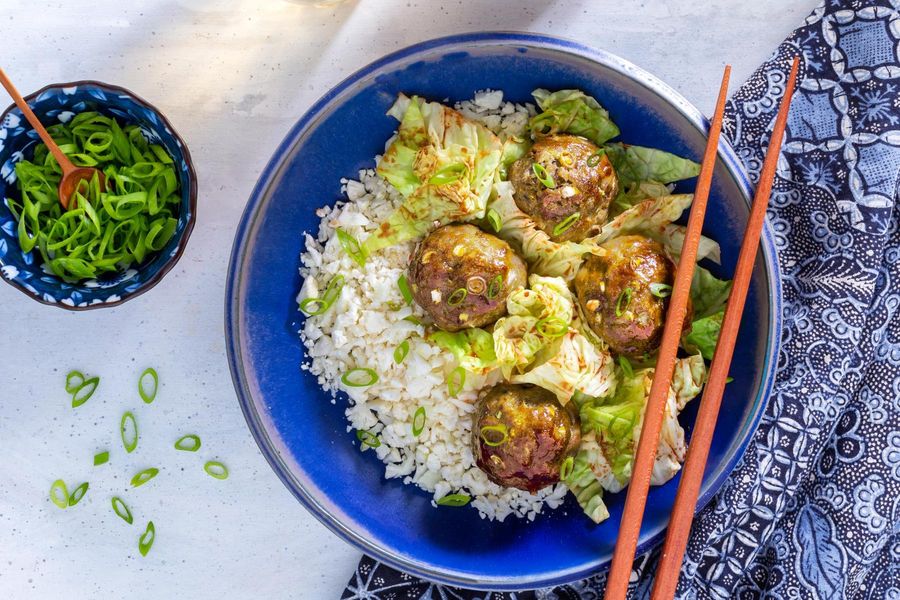 Chinese BBQ meatballs with cabbage and char siu sauce over cauliflower “rice”