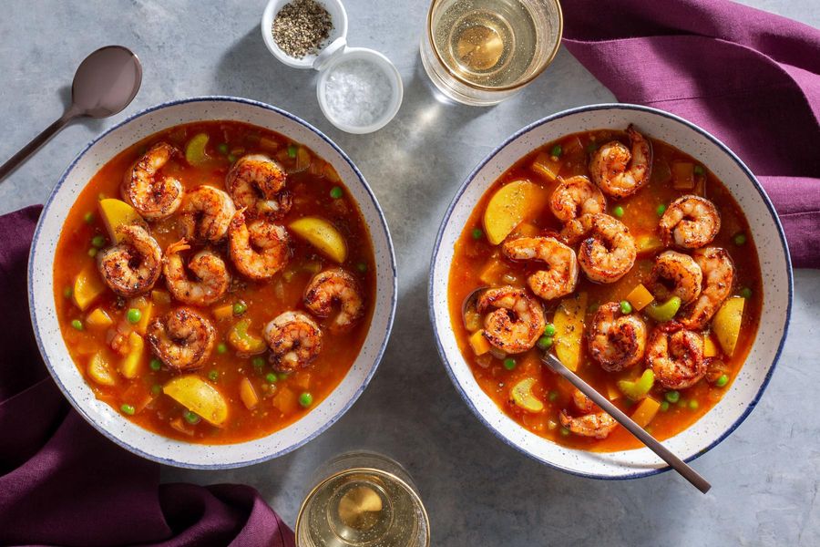 Spanish shrimp soup with potatoes, peas, and smoked paprika