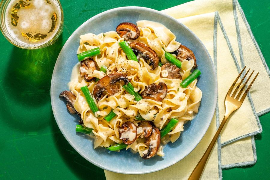 Portobello mushroom stroganoff over egg noodles