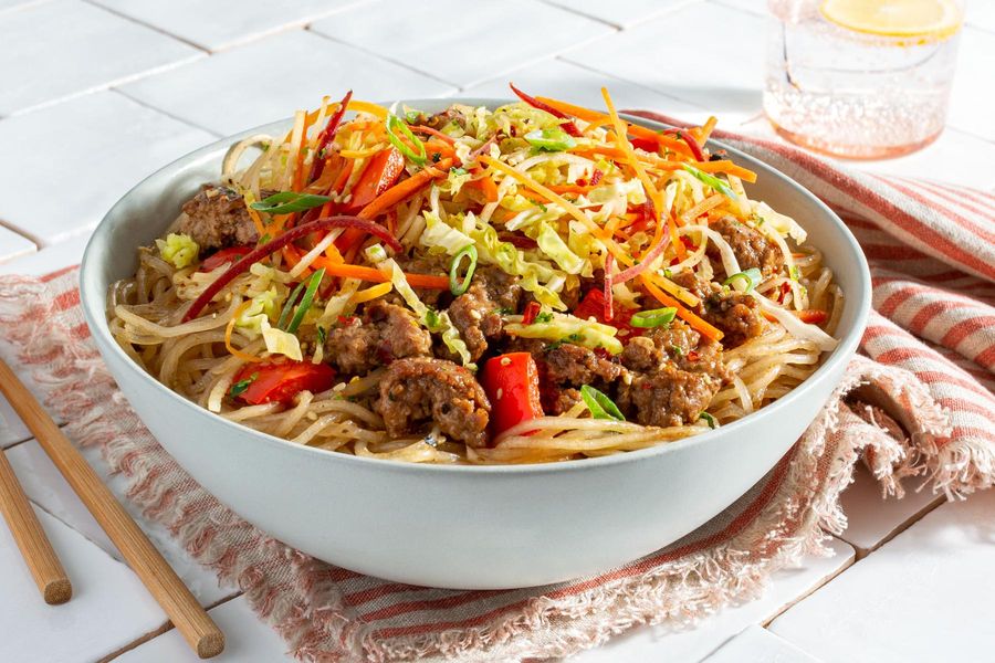 Sichuan glass noodle bowl with pork, cabbage, and carrots