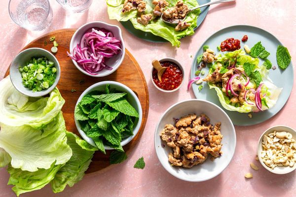 Thai chicken larb lettuce cups with scallions, cashews, and fresh mint