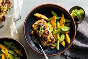 Kyoto salmon and mushrooms in parchment with mango-cucumber salad