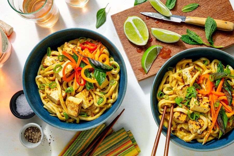 Pork cashew curry with udon and fresh herb salad
