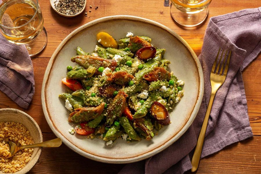 Stovetop penne casserole with carrots, peas, and ricotta