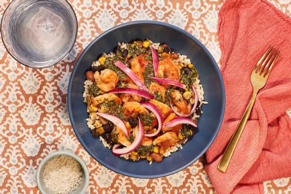 Barbacoa shrimp over brown rice with spiced beans, corn, and chimichurri